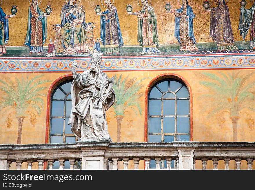 Religious Statue On Church Balcony.