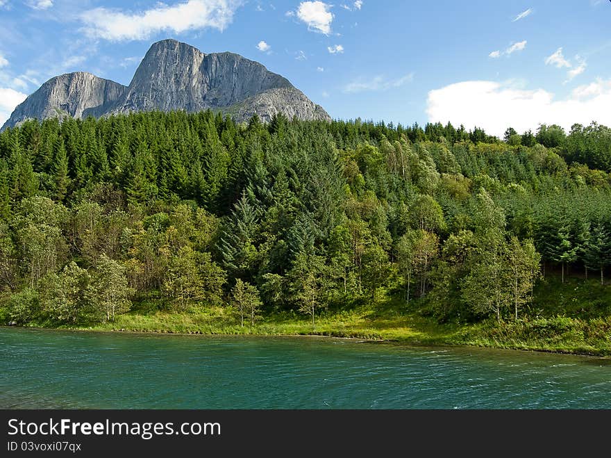 Green river with trees in Norway