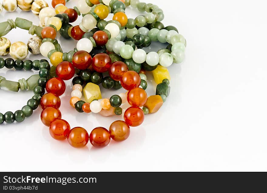 Colorful crystal beads on white. Colorful crystal beads on white.