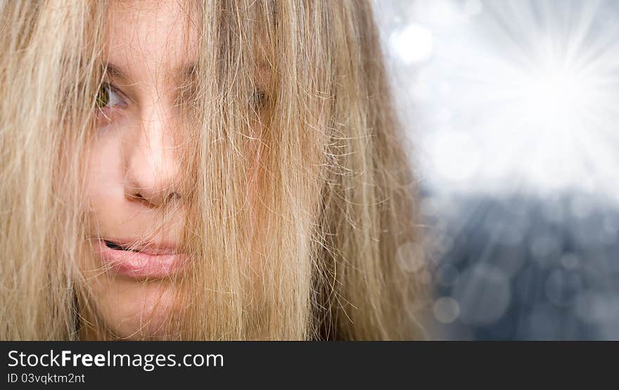 Naughty girl looking through her hair