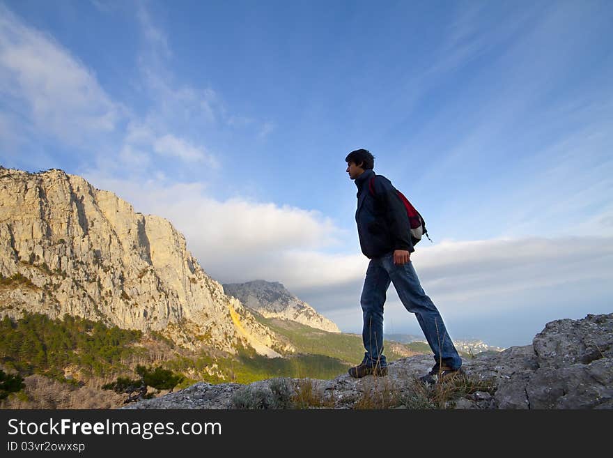 Man on top of the mountain