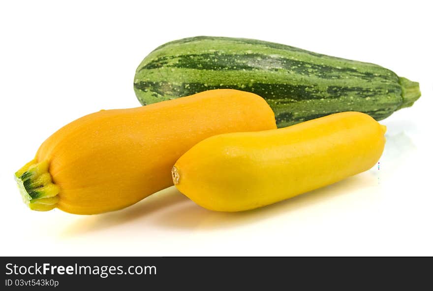 Yellow and Green zucchini  on white