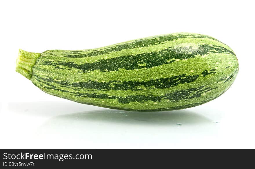 Green zucchini  on white