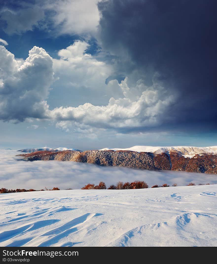 Landscape in the mountains. Early snow had fallen in October. Carpathian mountains, Ukraine. Landscape in the mountains. Early snow had fallen in October. Carpathian mountains, Ukraine.