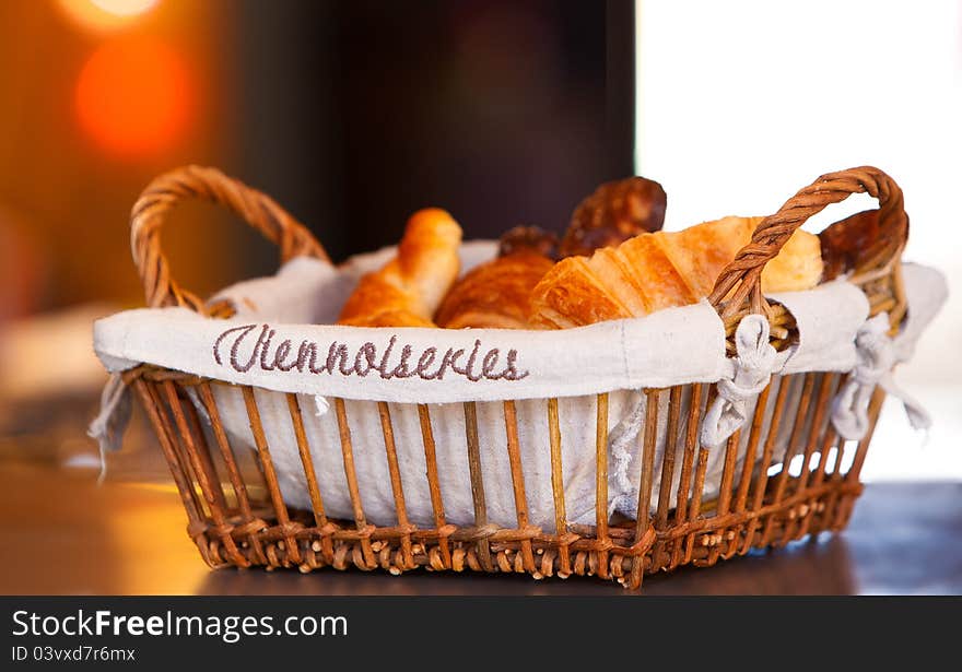 Basket with croissants for breakfast