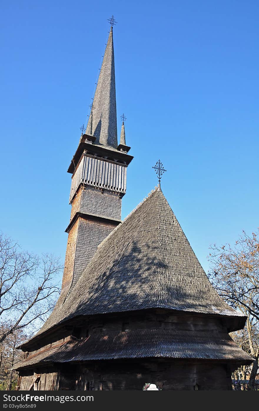 Wooden church raising to heaven. Surdesti church located in maramures land of romania (northern transylvania) is the highest wooden church in europe: 72 meter high with a tower of 54 meter high. Wooden church raising to heaven. Surdesti church located in maramures land of romania (northern transylvania) is the highest wooden church in europe: 72 meter high with a tower of 54 meter high.