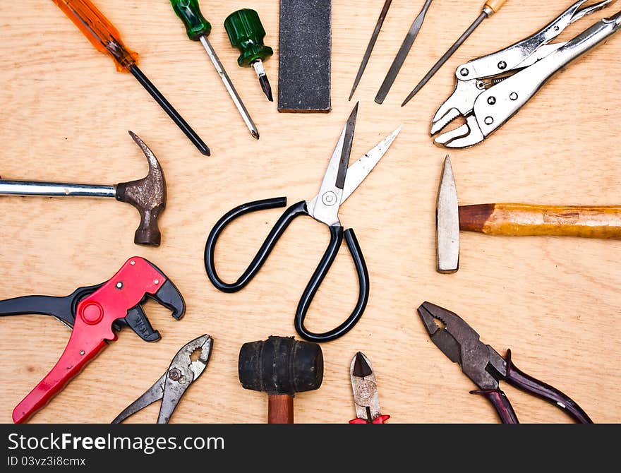 Tools crafts. Put together on a wooden floor. Tools crafts. Put together on a wooden floor.