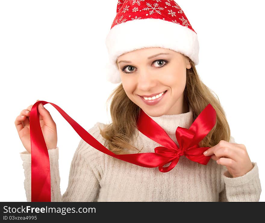 Christmas girl with a red bow on a white background. Christmas girl with a red bow on a white background