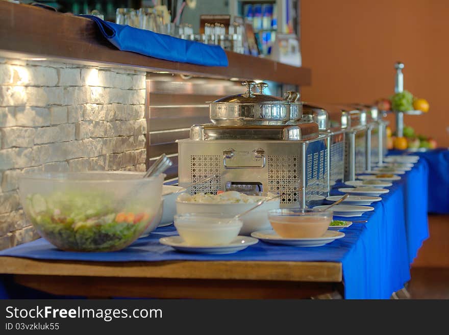 Banquet meals and Metallic banquet meal trays served on tables. Banquet meals and Metallic banquet meal trays served on tables