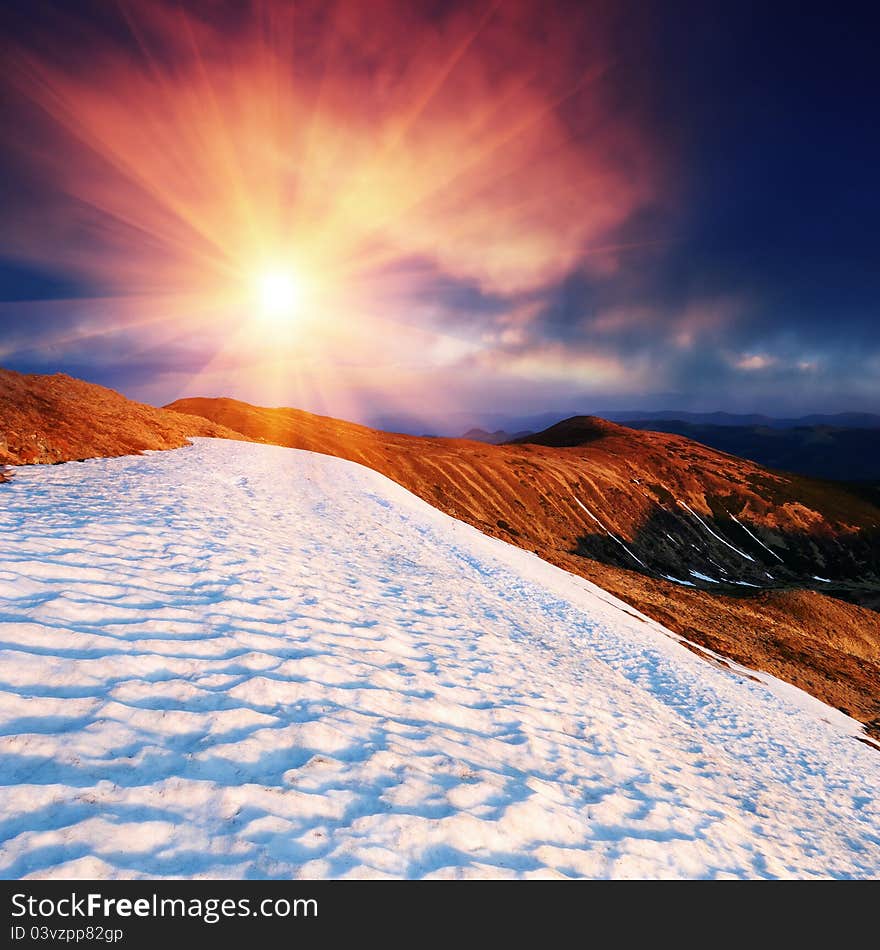 Spring in mountains and last snow. The Ukrainian mountains Carpathians