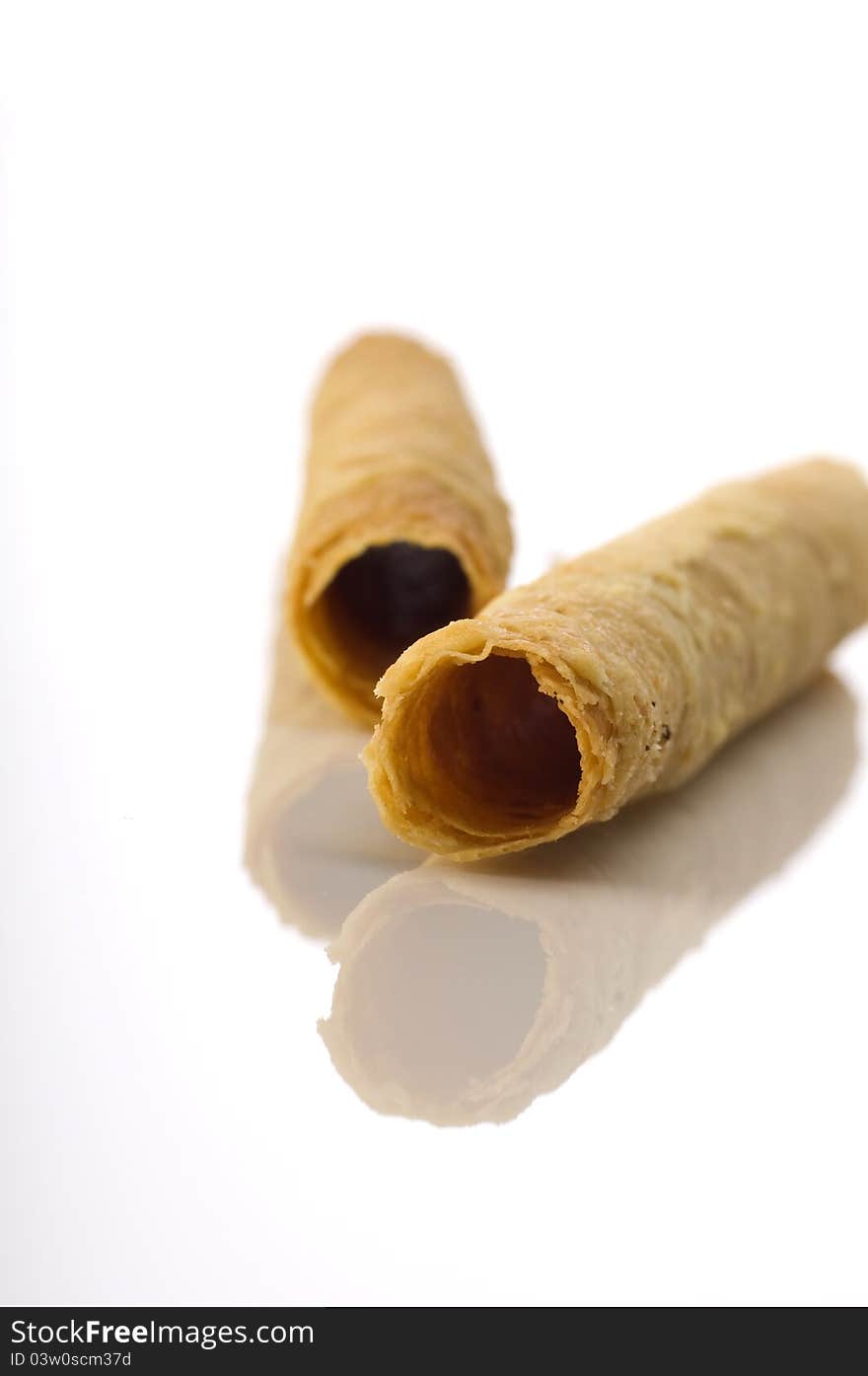 Egg rolls is snack that good to eat. SHot on white background