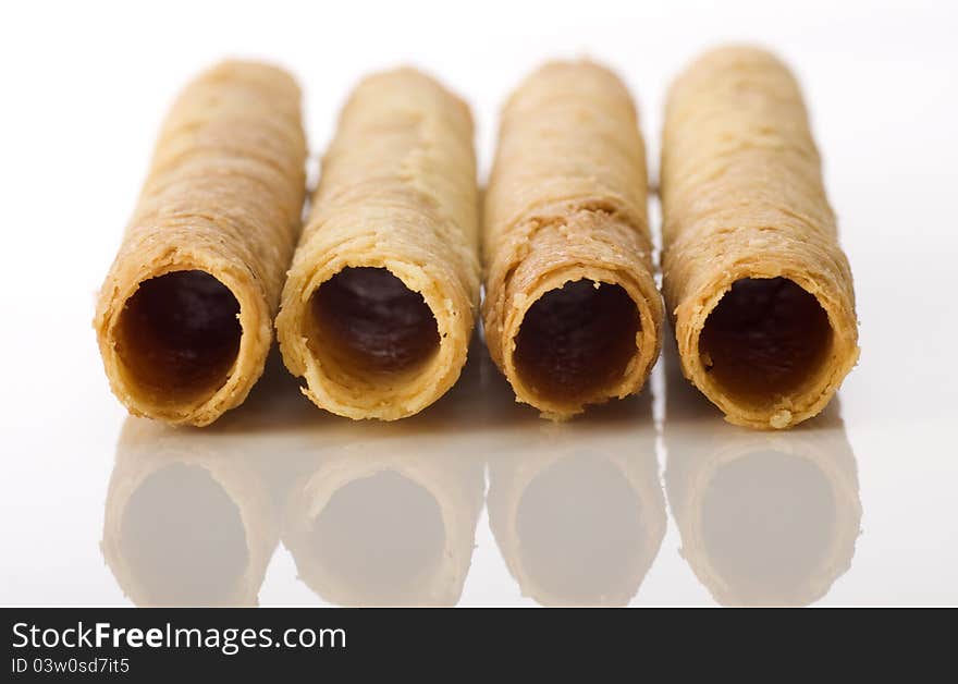 Egg rolls is snack that good to eat. SHot on white background