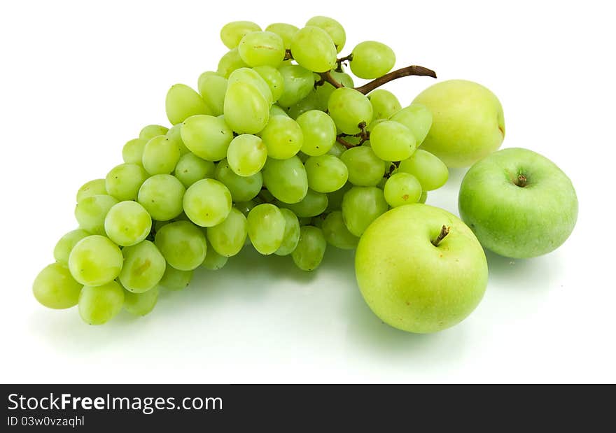 Bunch of green grapes and apples