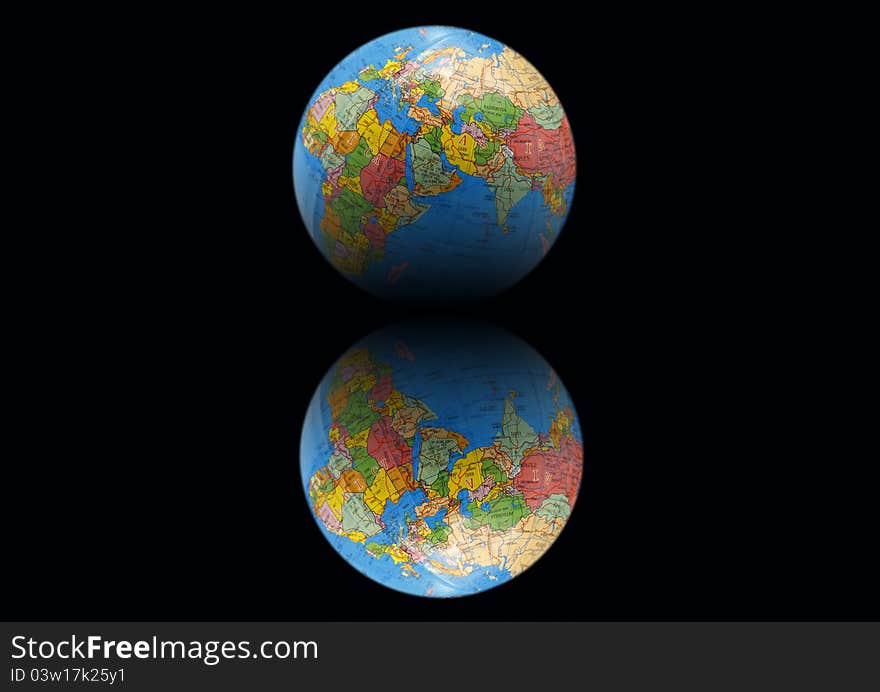 Globe, Earth on a black background with mirror