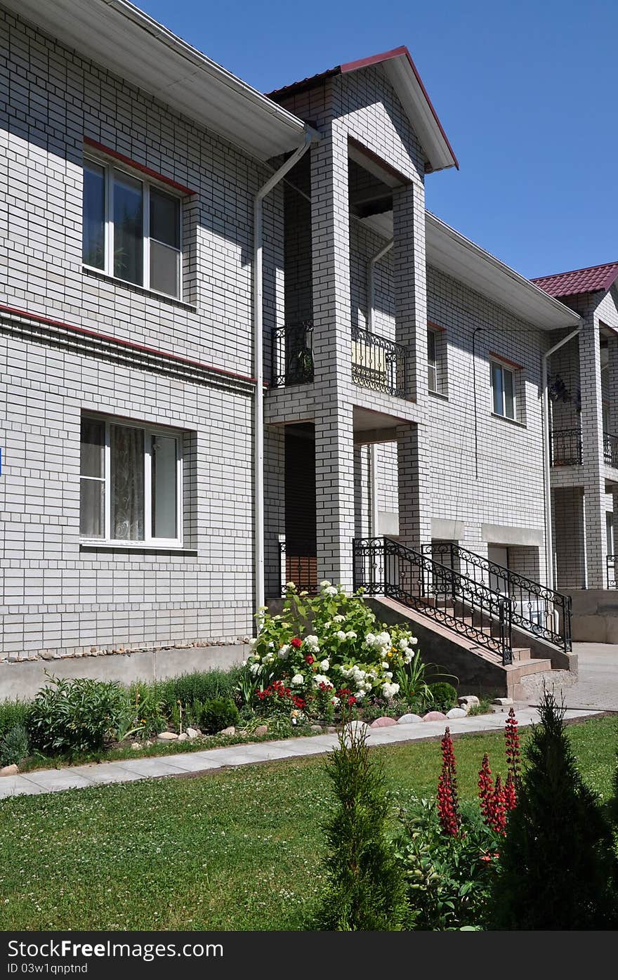 Town house in white brick. Russia. Town house in white brick. Russia.