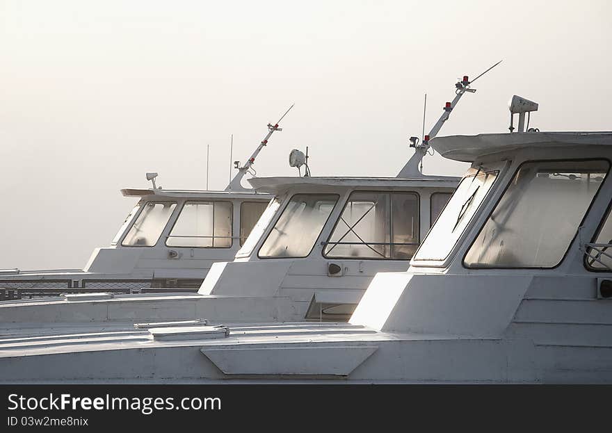 Boats on river in fog