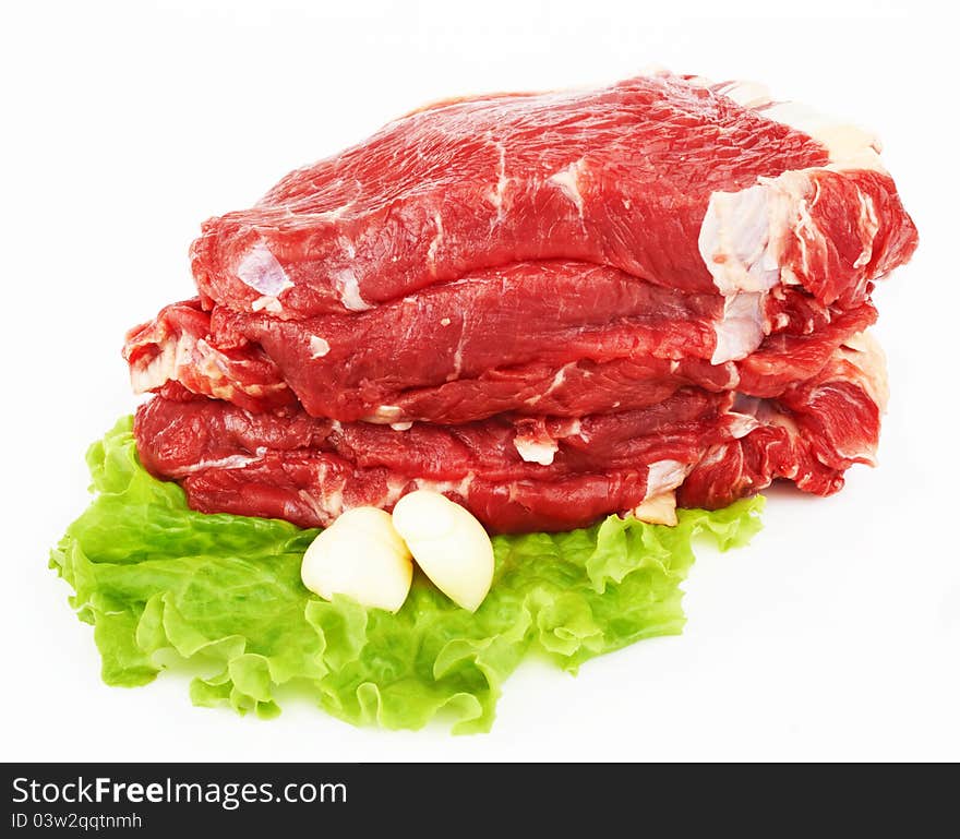 The pieces of raw fillet steaks on white background.