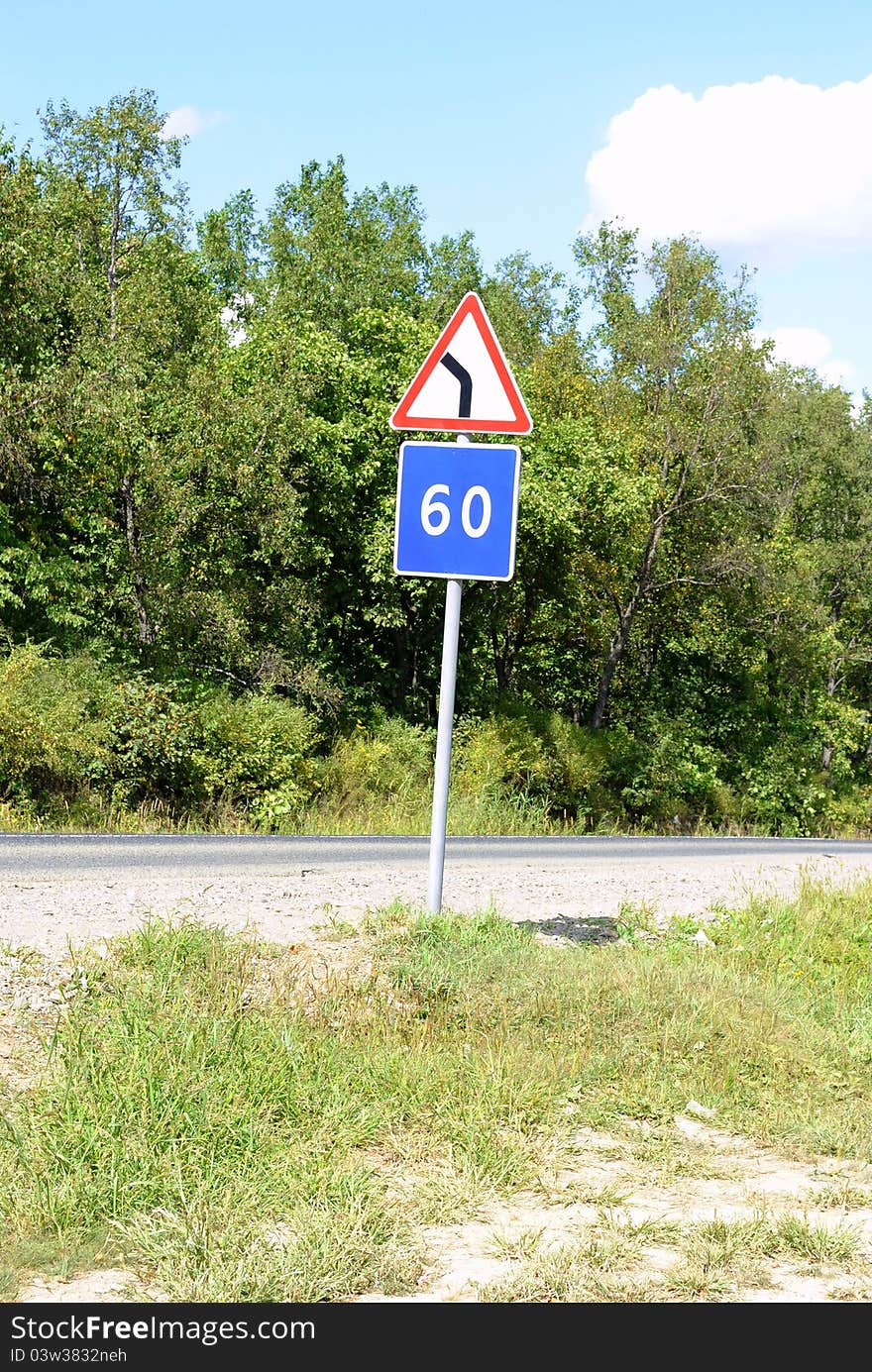 Curved Road Traffic Sign on a a road. Curved Road Traffic Sign on a a road