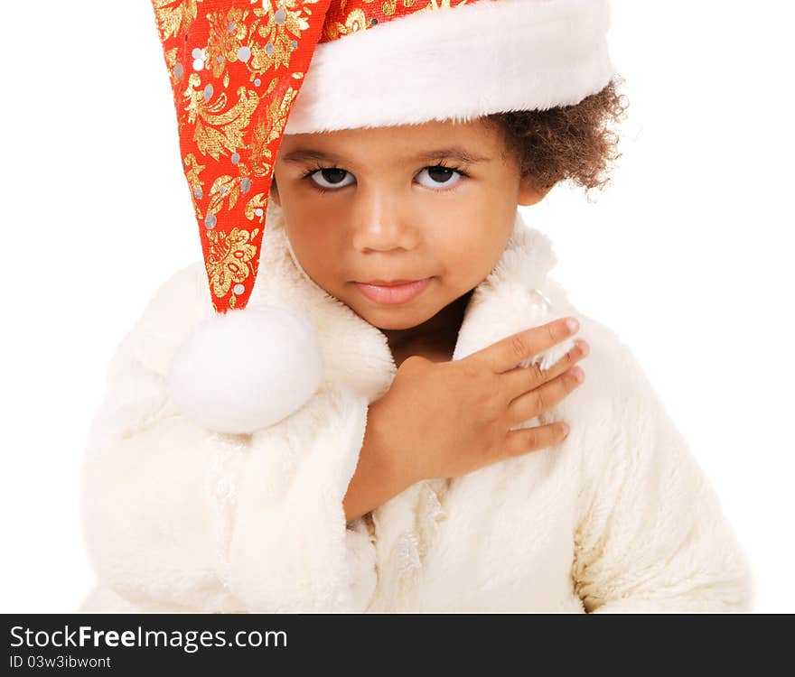 Portrait of a cute baby in Christmas hat and fur on white background. Portrait of a cute baby in Christmas hat and fur on white background