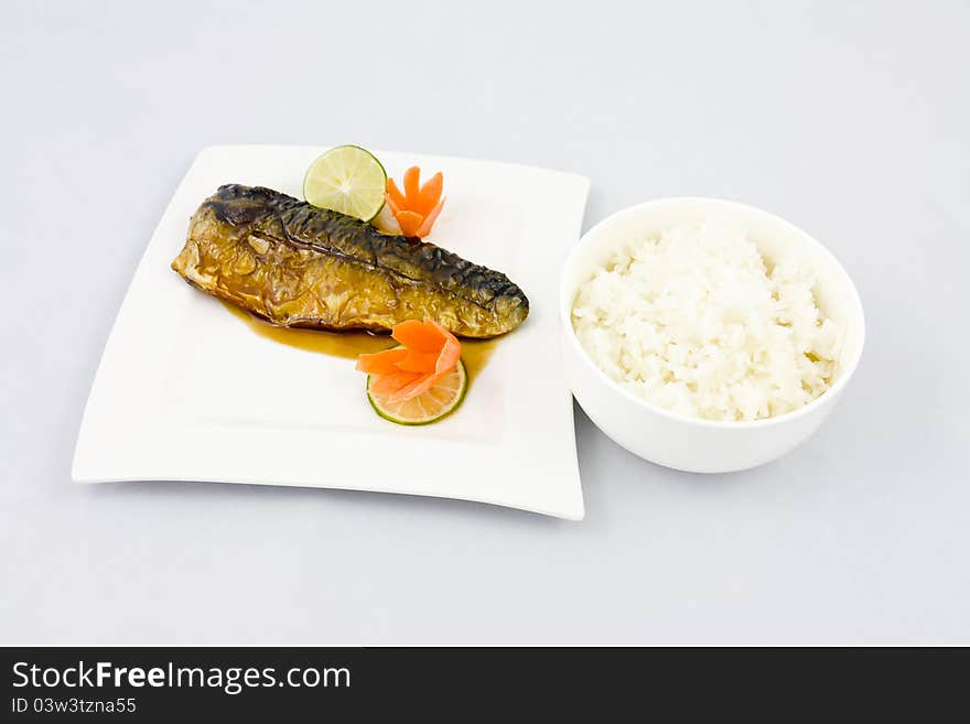 Saba, Mackerel grilled fish and a bowl of rice. Saba, Mackerel grilled fish and a bowl of rice.