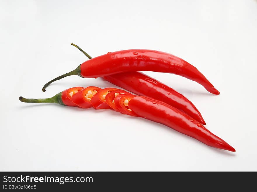 Red fresh chili pepper isolated on white background