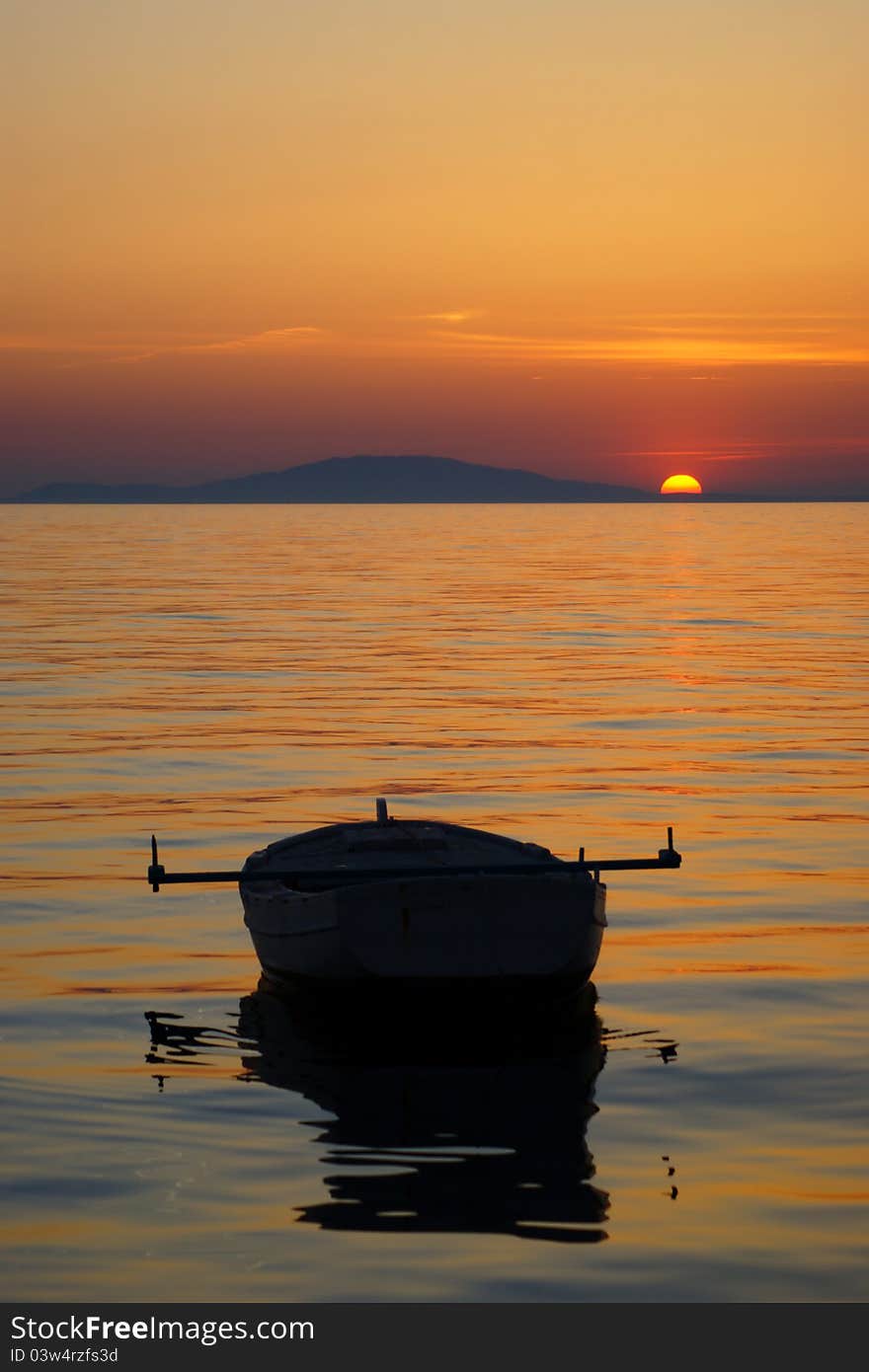 Sunset with fishing boat