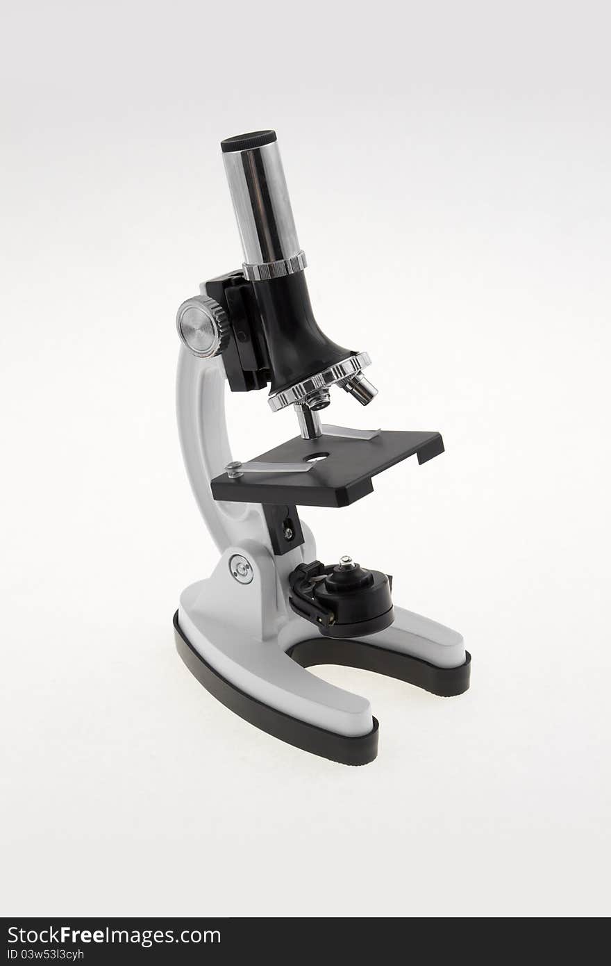 Laboratory microscope on a white background