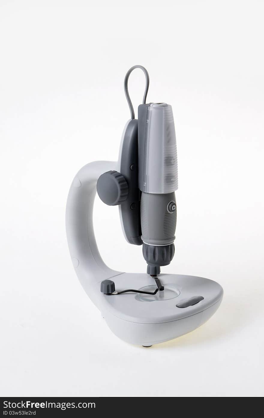 Laboratory microscope on a white background