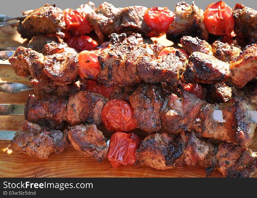 Pork shashlik with small tomatoes