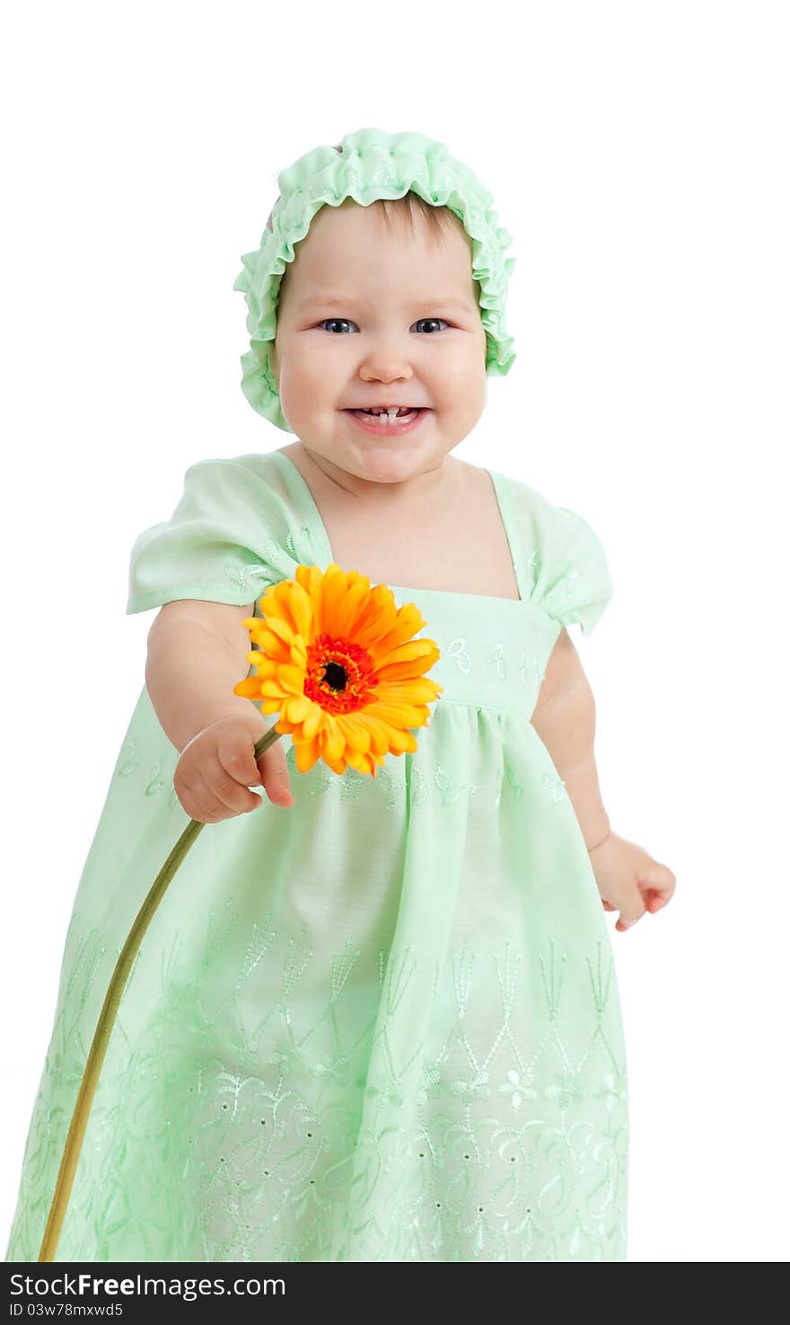 Cute little girl with flower gift on white