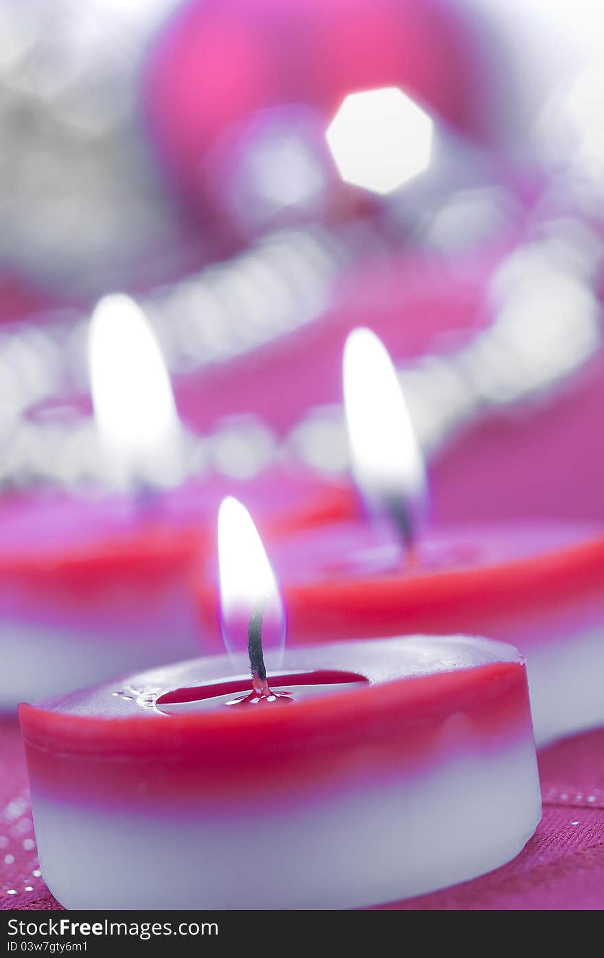 Lighting Christmas candles a close up