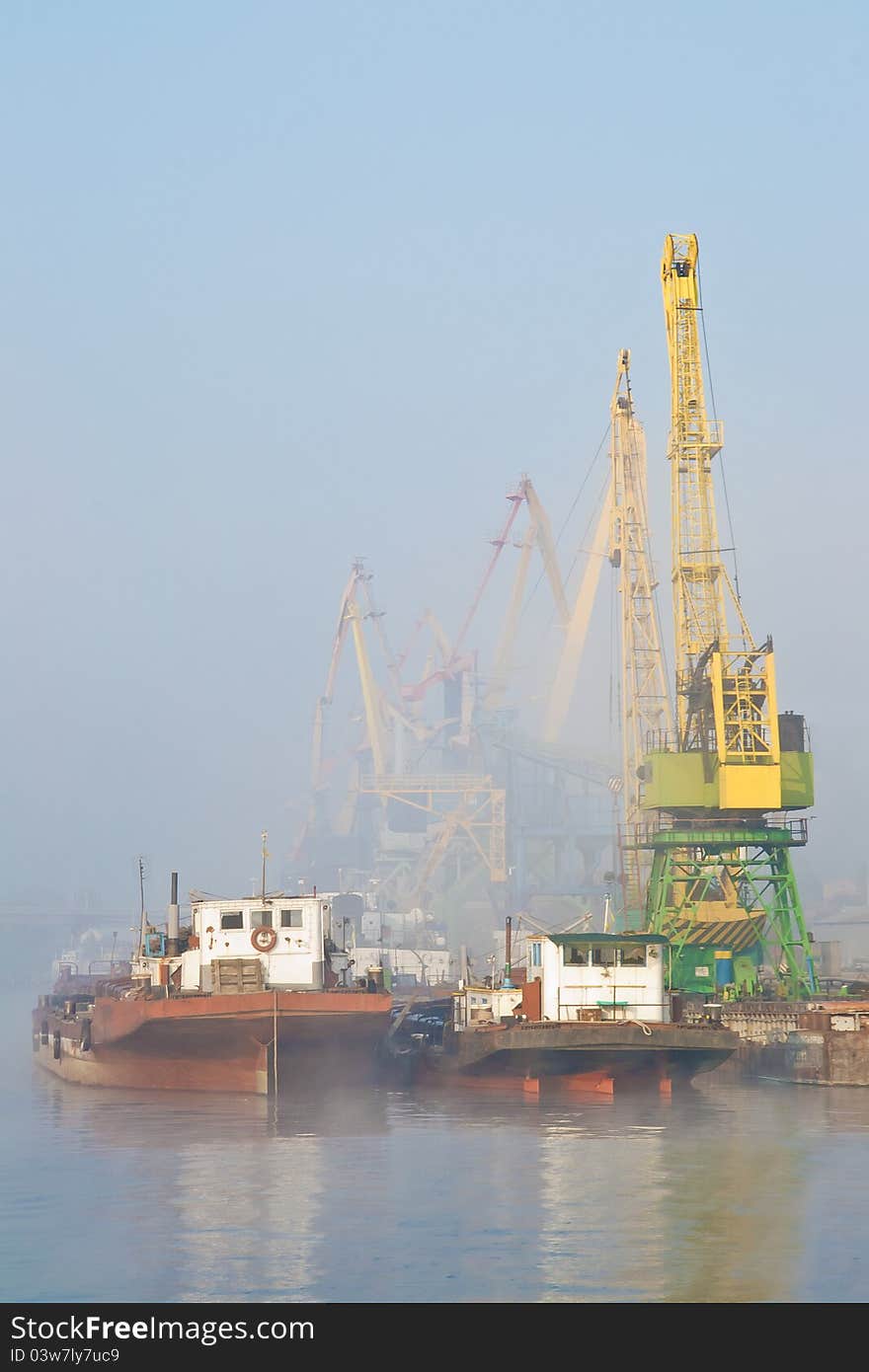 Dock on Dnieper river in fog