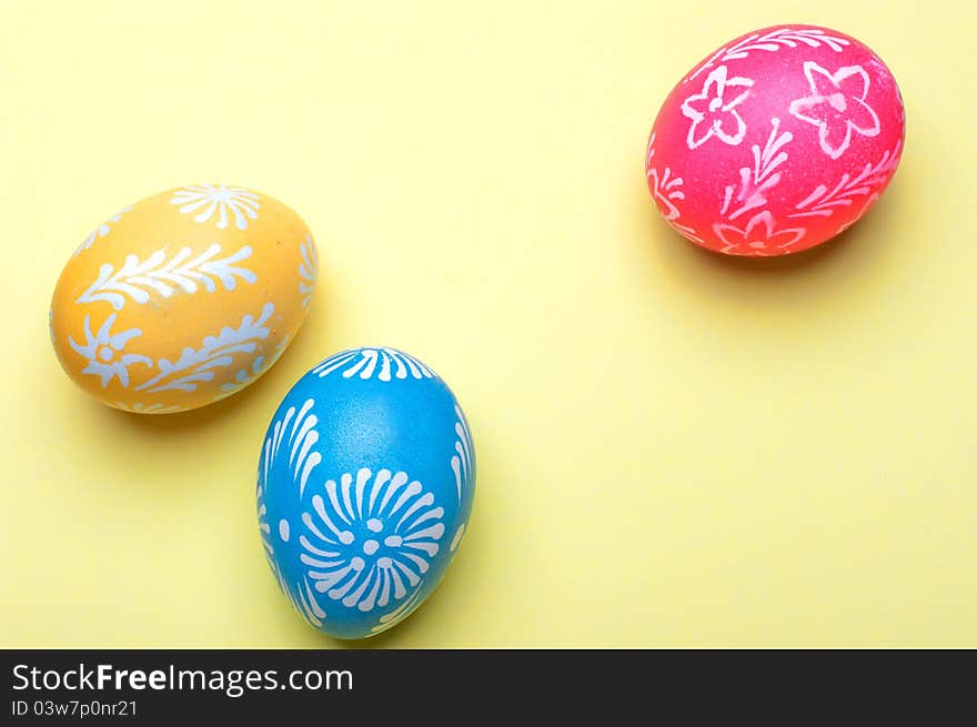 Easter eggs on a yellow background.