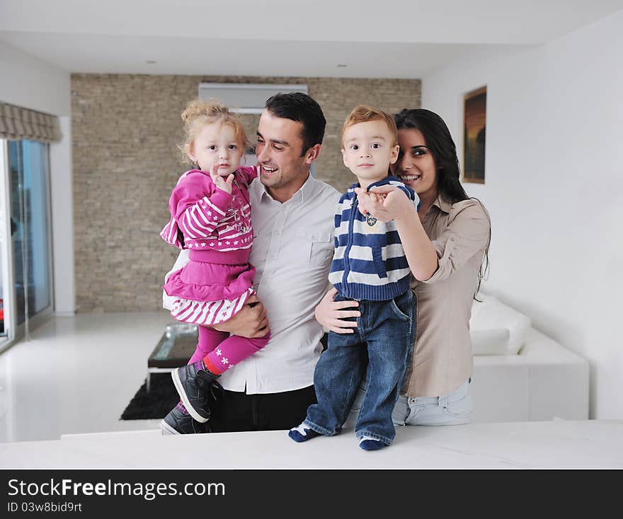 Happy young family have fun and relaxing at new home with bright furniture. Happy young family have fun and relaxing at new home with bright furniture