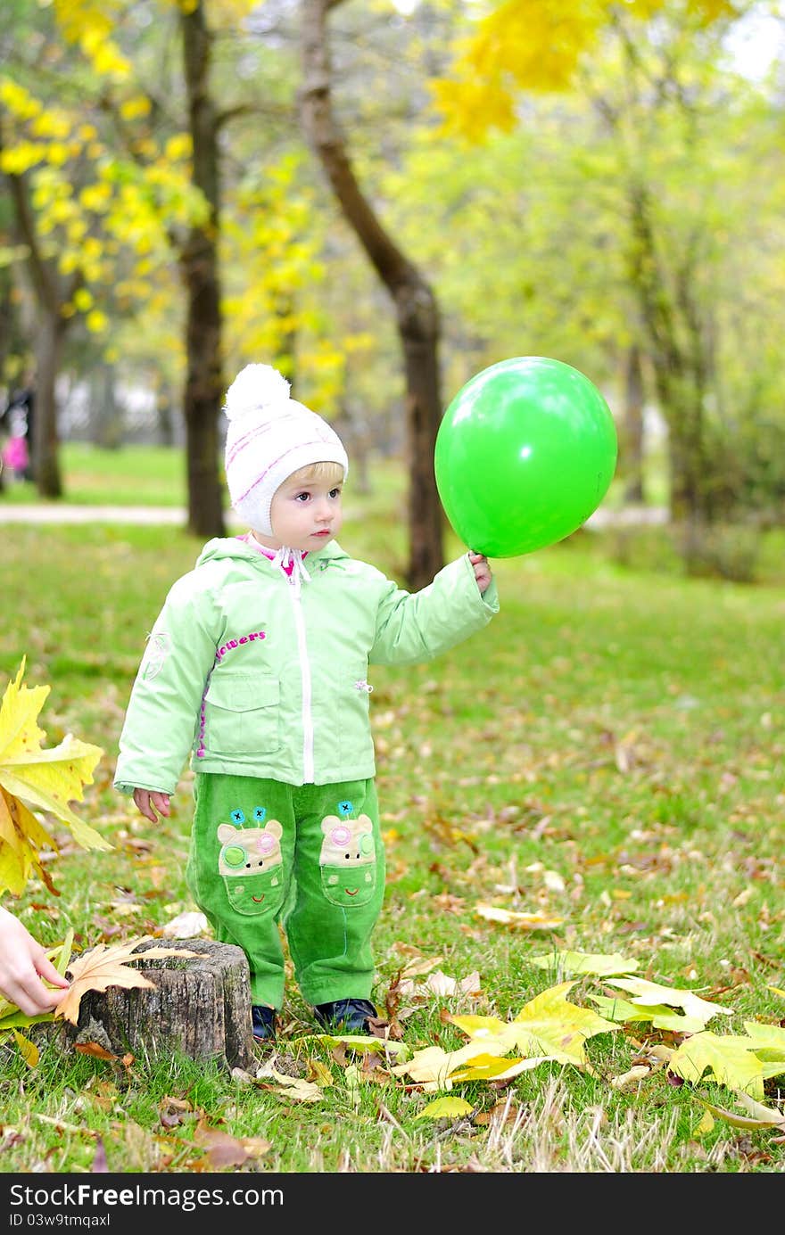 Small Beautiful Girl In Green Suit