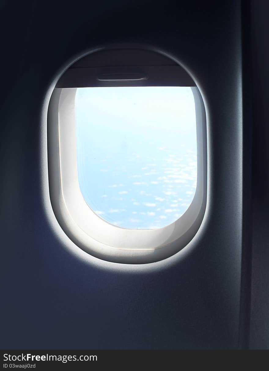 Jet plane interior cabin window sky view. Jet plane interior cabin window sky view