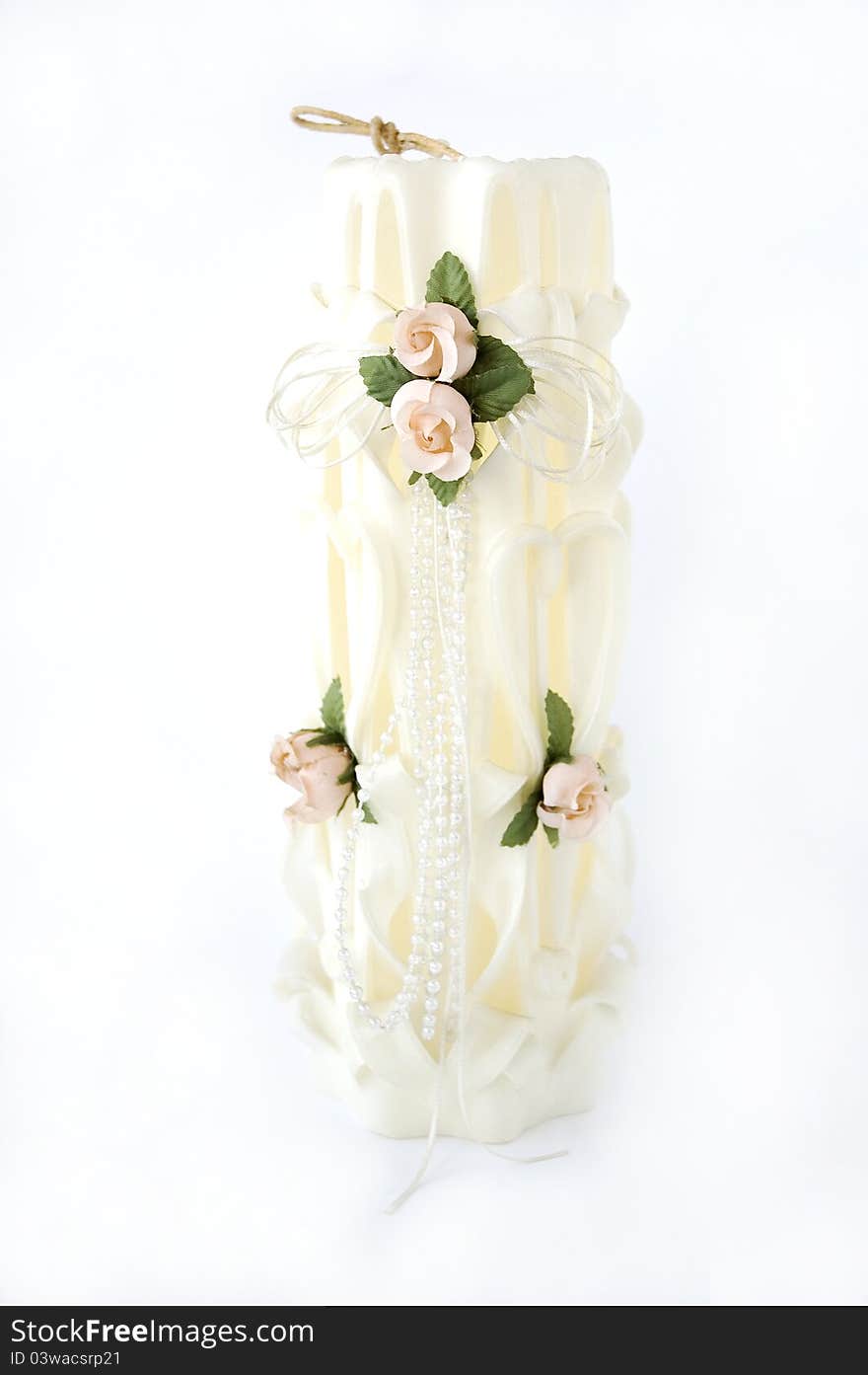 White romantic wedding roses candle. White romantic wedding roses candle