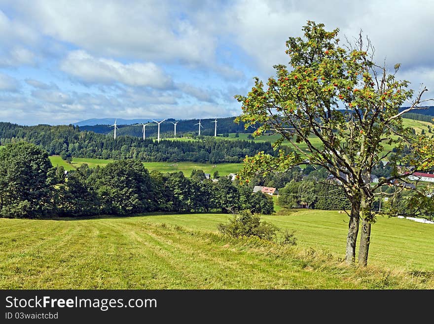 Wind turbines in mountains landscape