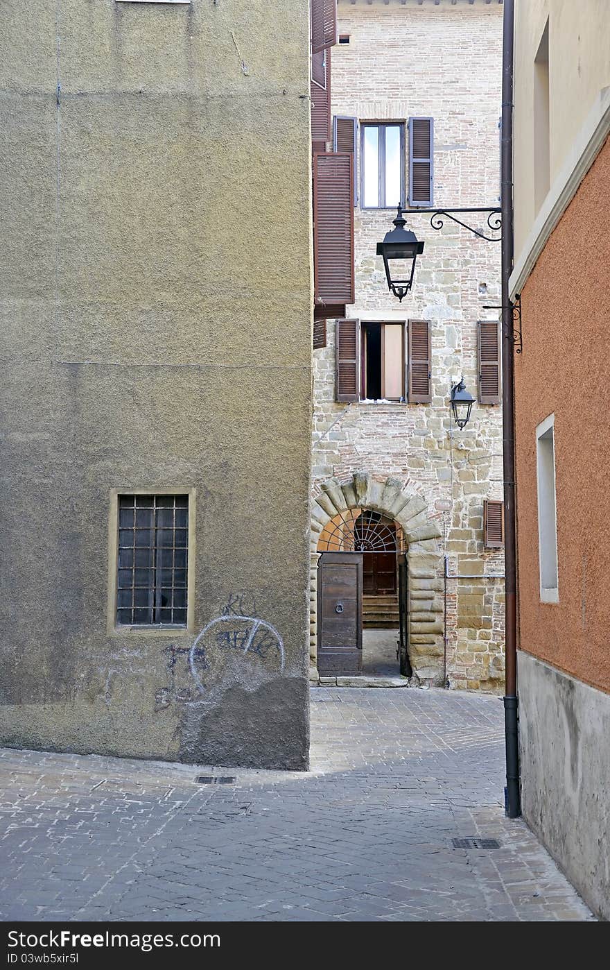 Narrow street in Camerino city of Italy near Ancona and Macerata, at 200 km far from Rome.