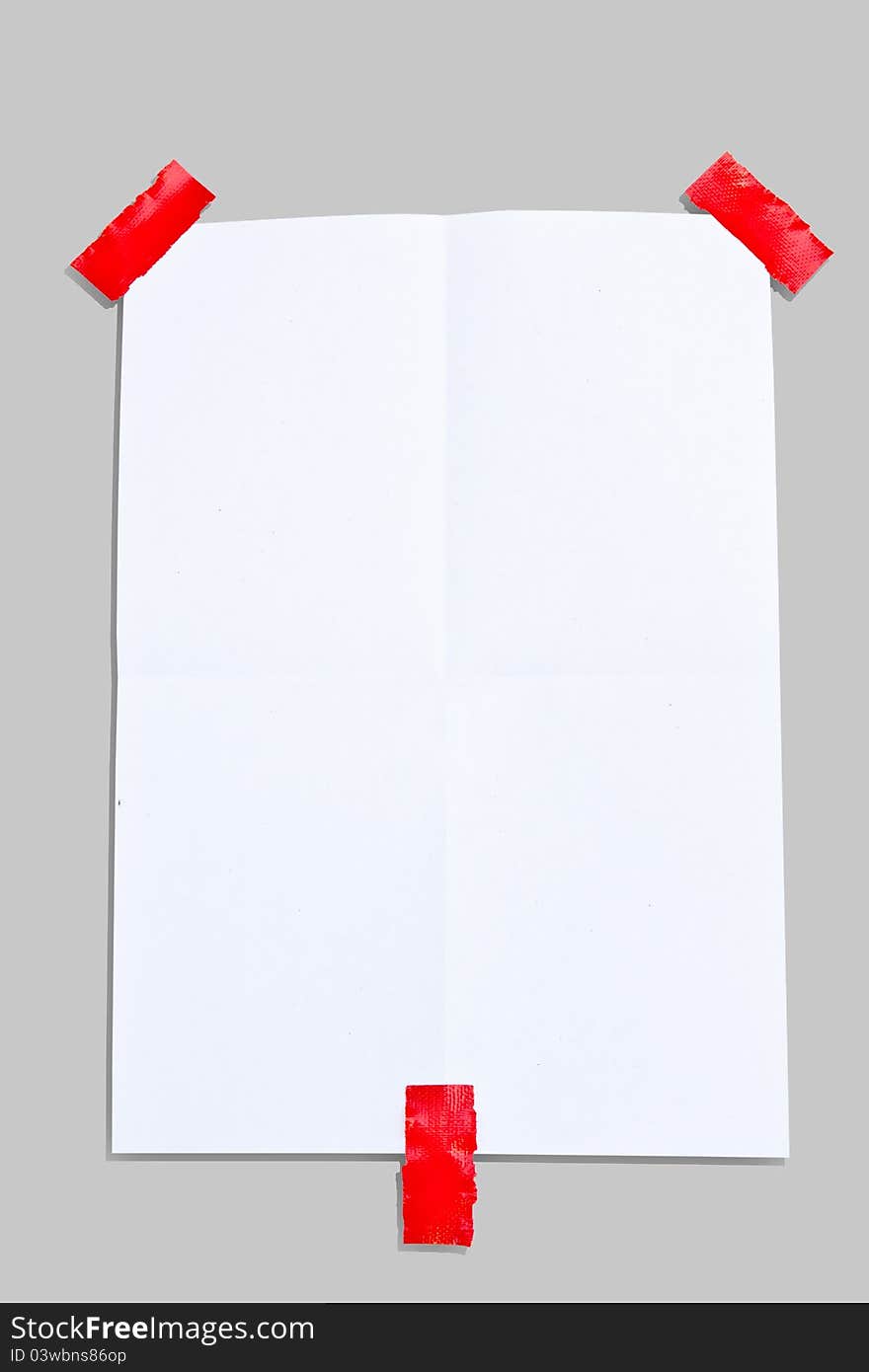 Note paper and 3 red tapes on white background