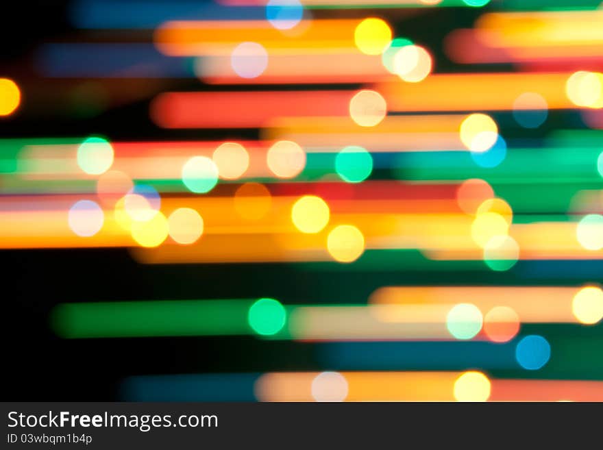 Color Bokeh on dark background. Line. Color Bokeh on dark background. Line.