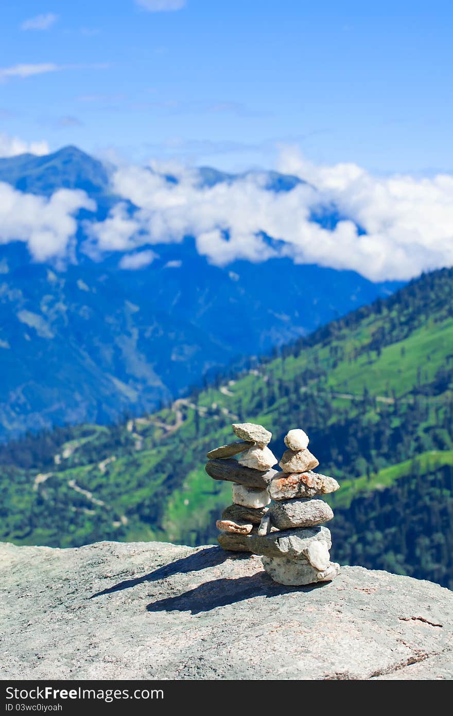 Two stones pyramid at mountains