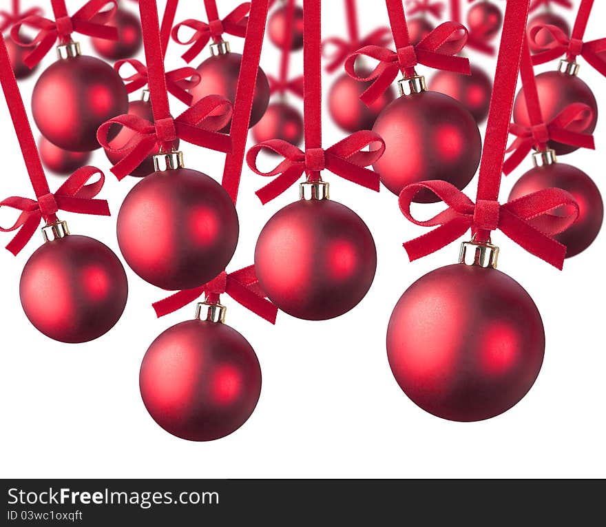 Red Christmas balls handing on white