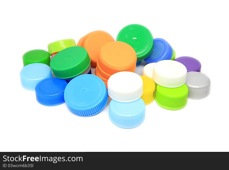 Colorful bottle lid on white background