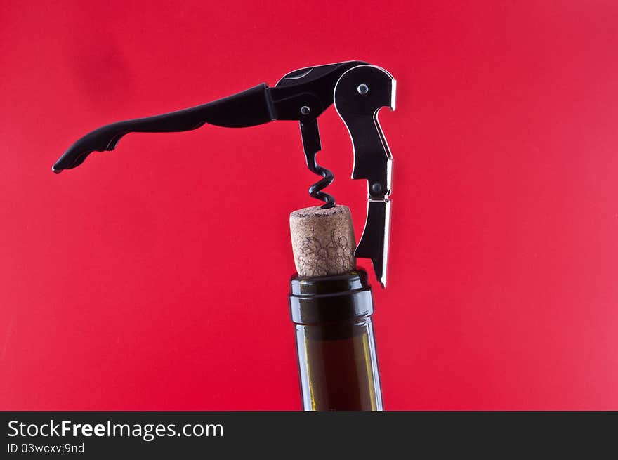 Bottle with a cork and corkscrew 2