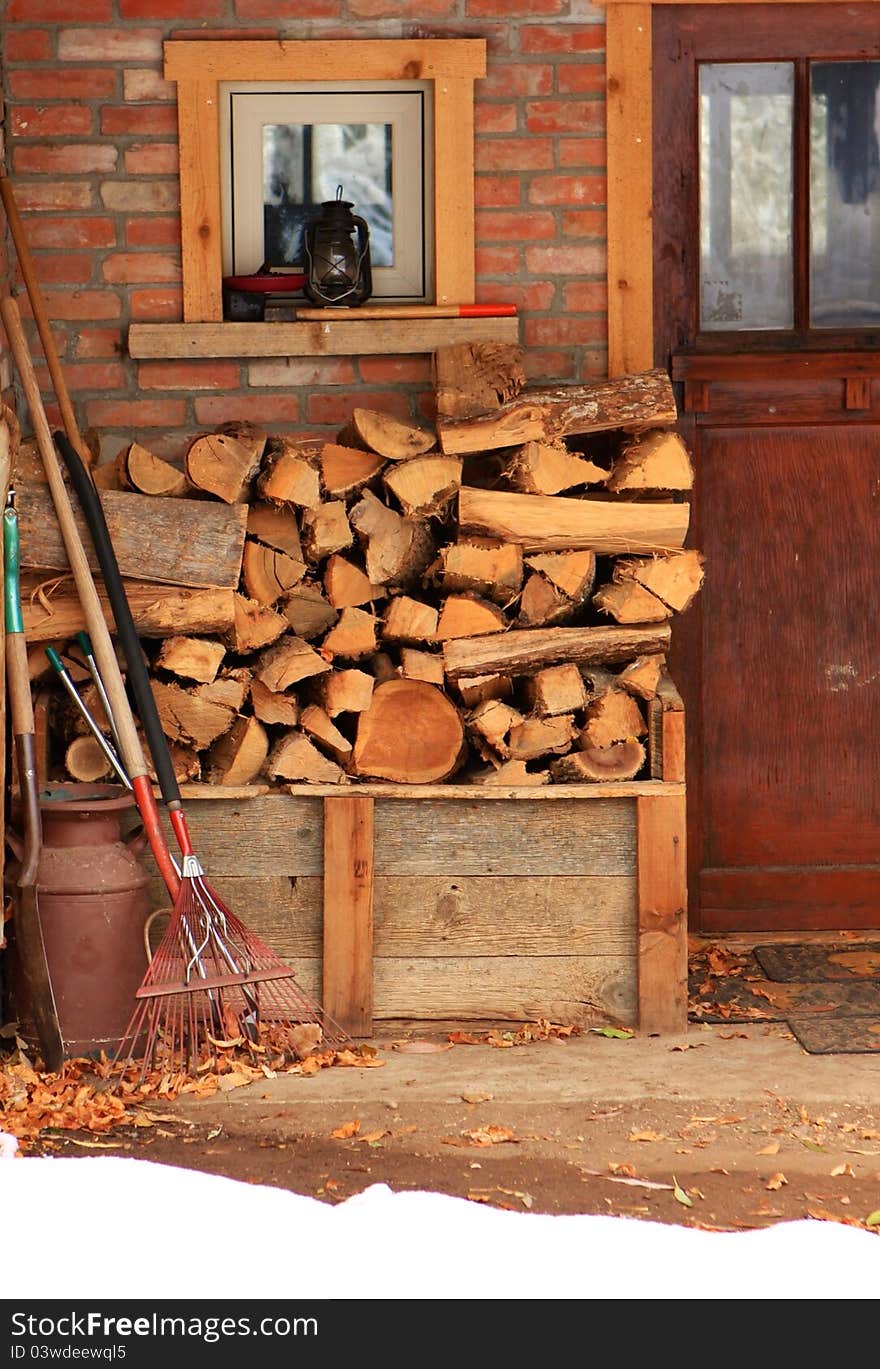 A rustic background with a pile of wood. A rustic background with a pile of wood.