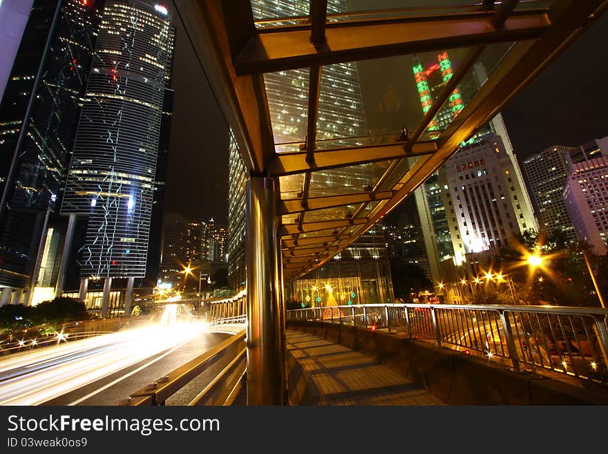 A view of the lights and skyscrapers in downtown Hong Kong at night