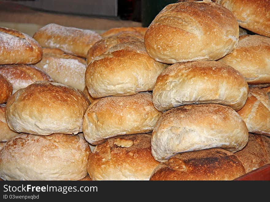 A Display of Freshly Made Crusty Bread Loaves.