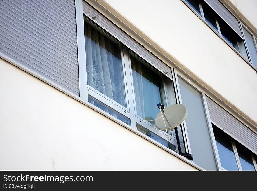 Small TV Satellite dish at the window