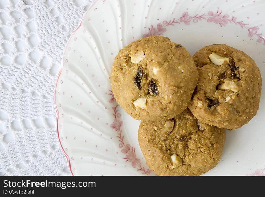 Three of cookies on sweet plate top view. Three of cookies on sweet plate top view